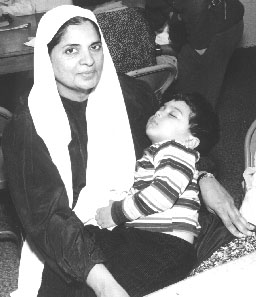 Photo of Azra with her young son, Mohammed
